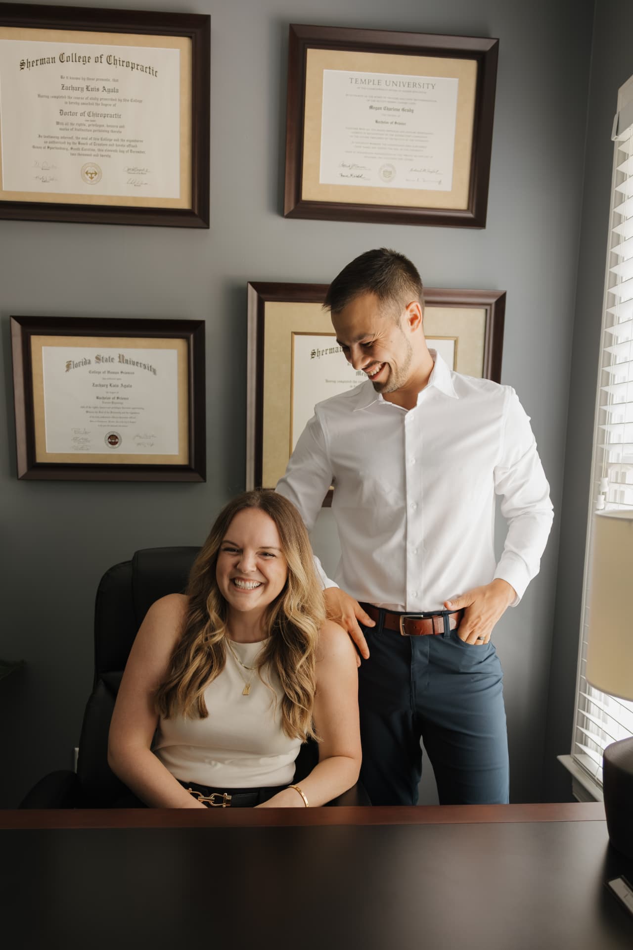 The doctors of Empower Spine + Body in their office
